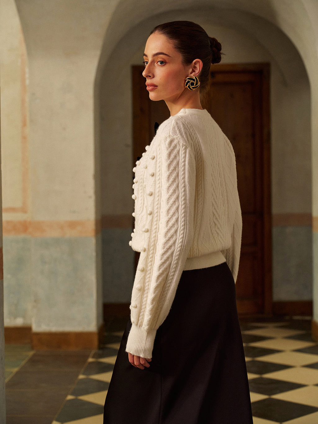 Strickpullover mit Schleife und Bommeln