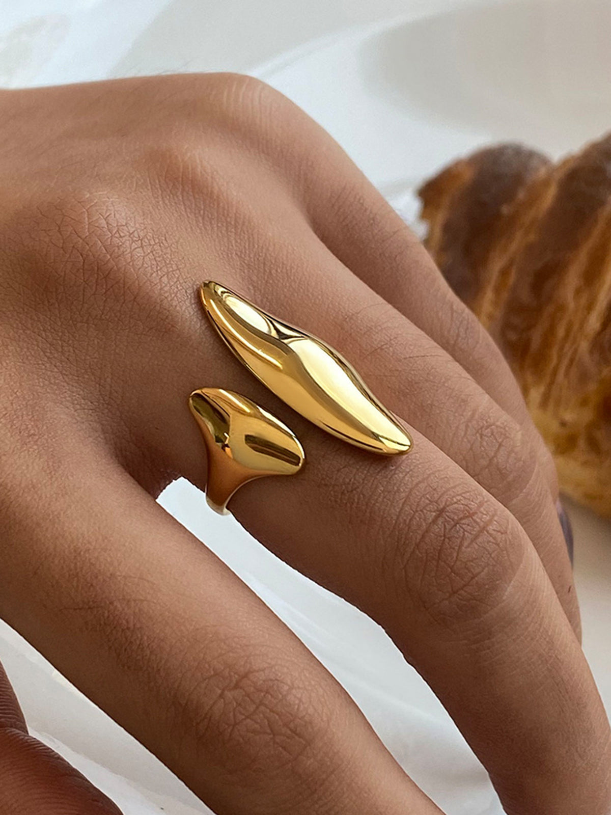 Bague ouverte asymétrique
