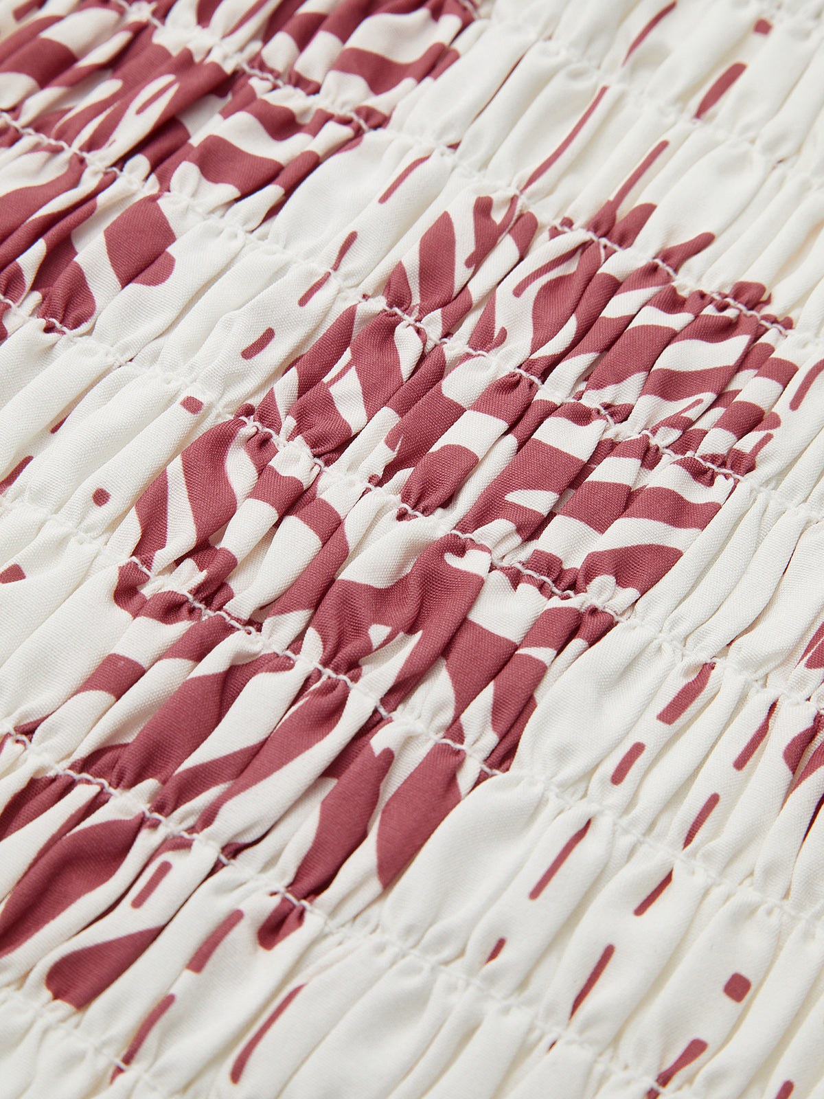 Robe smockée à fleurs à épaules dénudées 