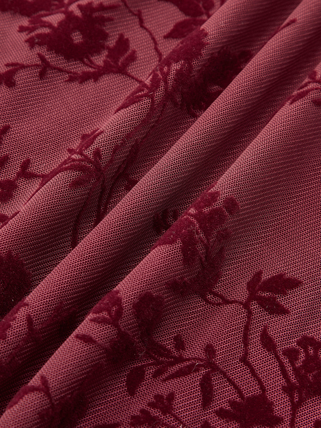Geblümtes Kleid mit Rüschensaum und Bindedetail vorne