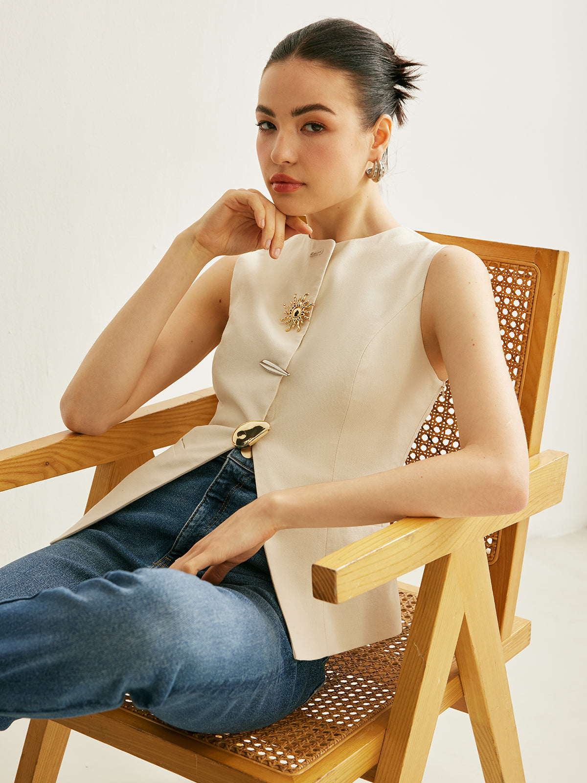 Gilet fendu avec détails métalliques