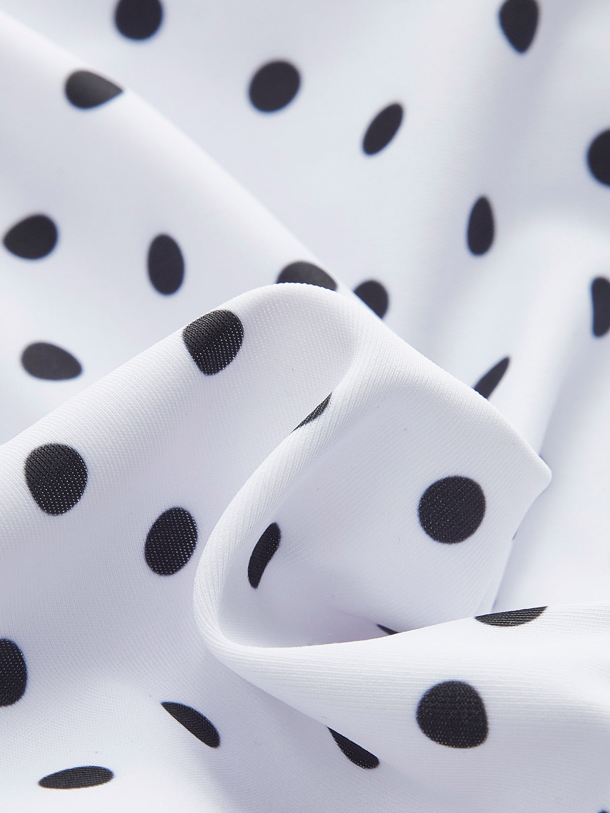 Maillot de bain une pièce à pois contrastés 