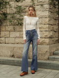 Jeans mit weitem Bein, hoher Taille und Knopfdetails
