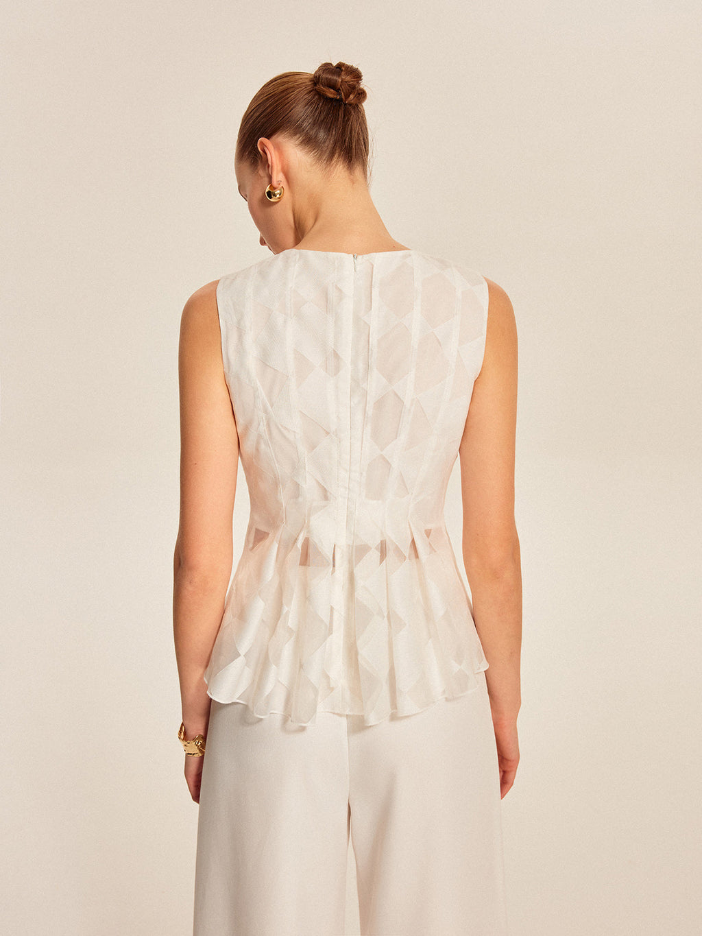 Haut péplum géométrique semi-transparent