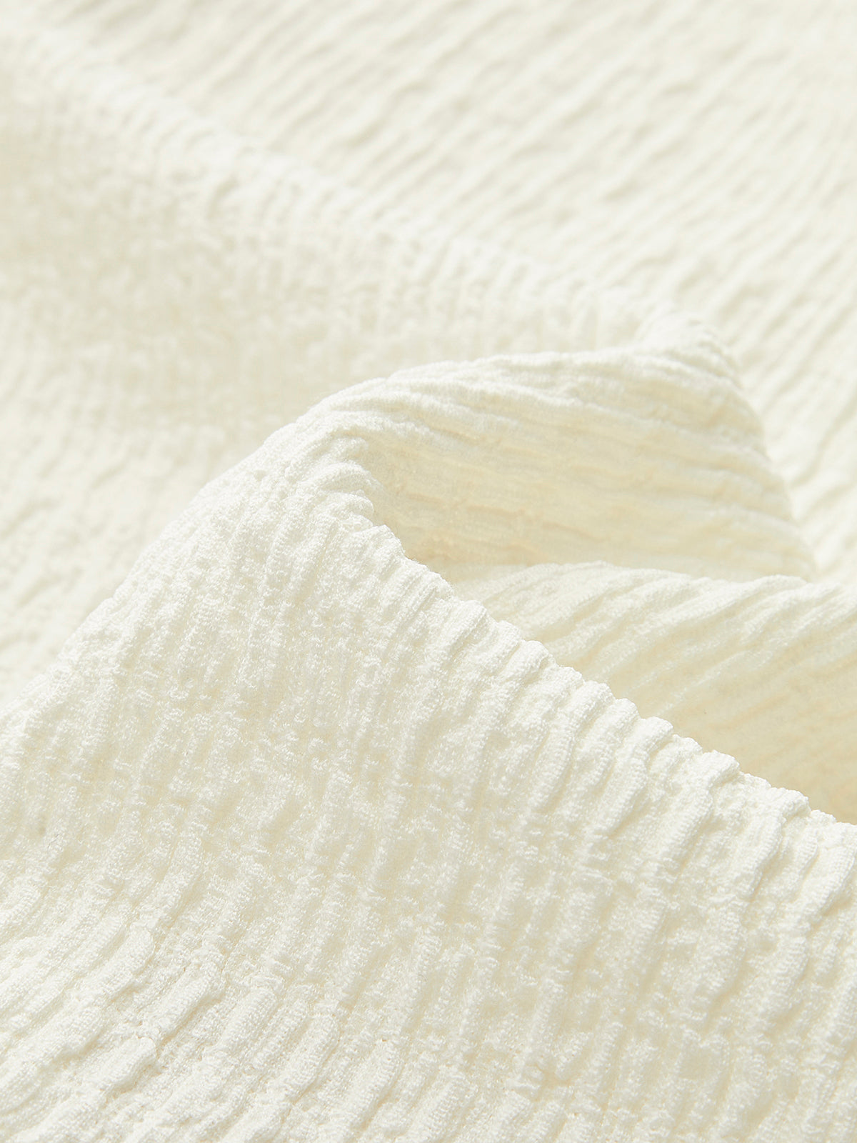 Haut sans manches à col en V et nœud sur le devant 