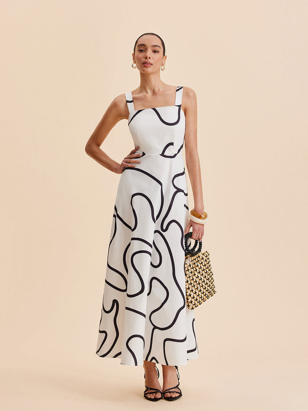 Quadratisches Trägerkleid mit abstraktem Linienmuster