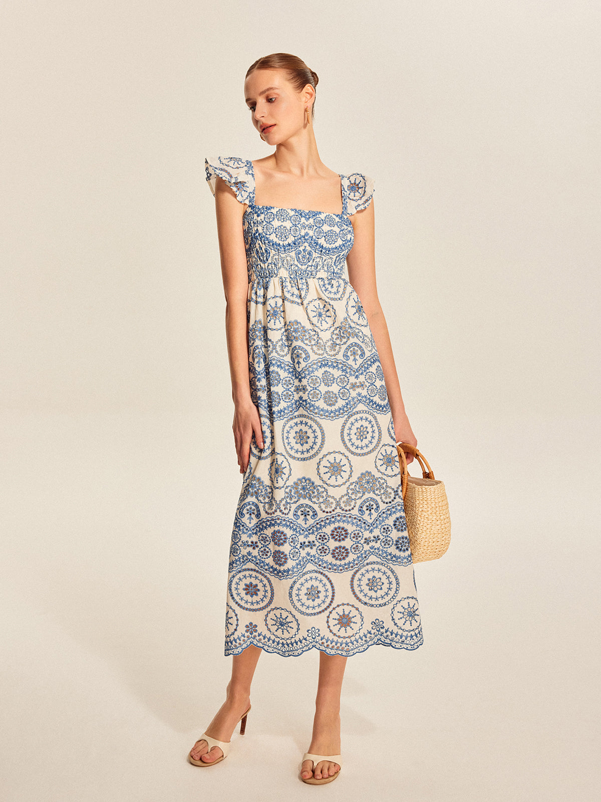 Halbtransparentes Boho-Kleid mit Blumenmuster und Rückenausschnitt 