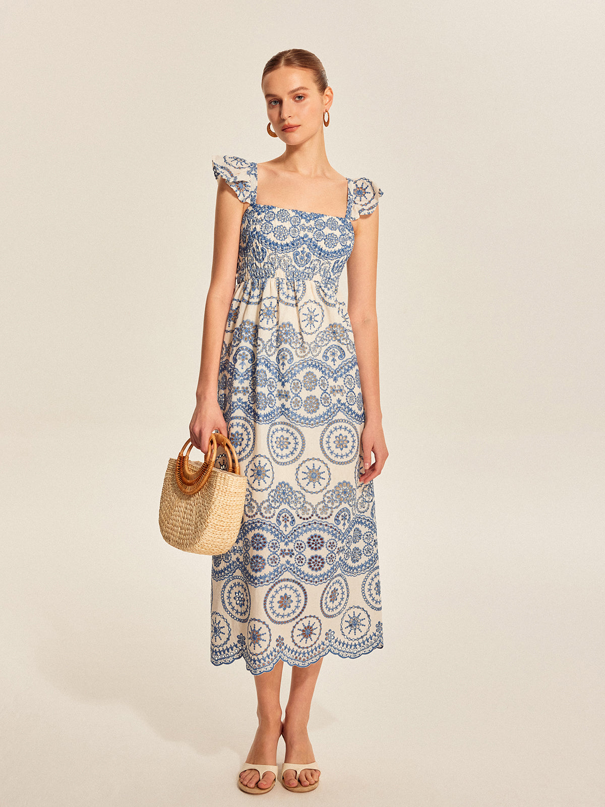 Halbtransparentes Boho-Kleid mit Blumenmuster und Rückenausschnitt 