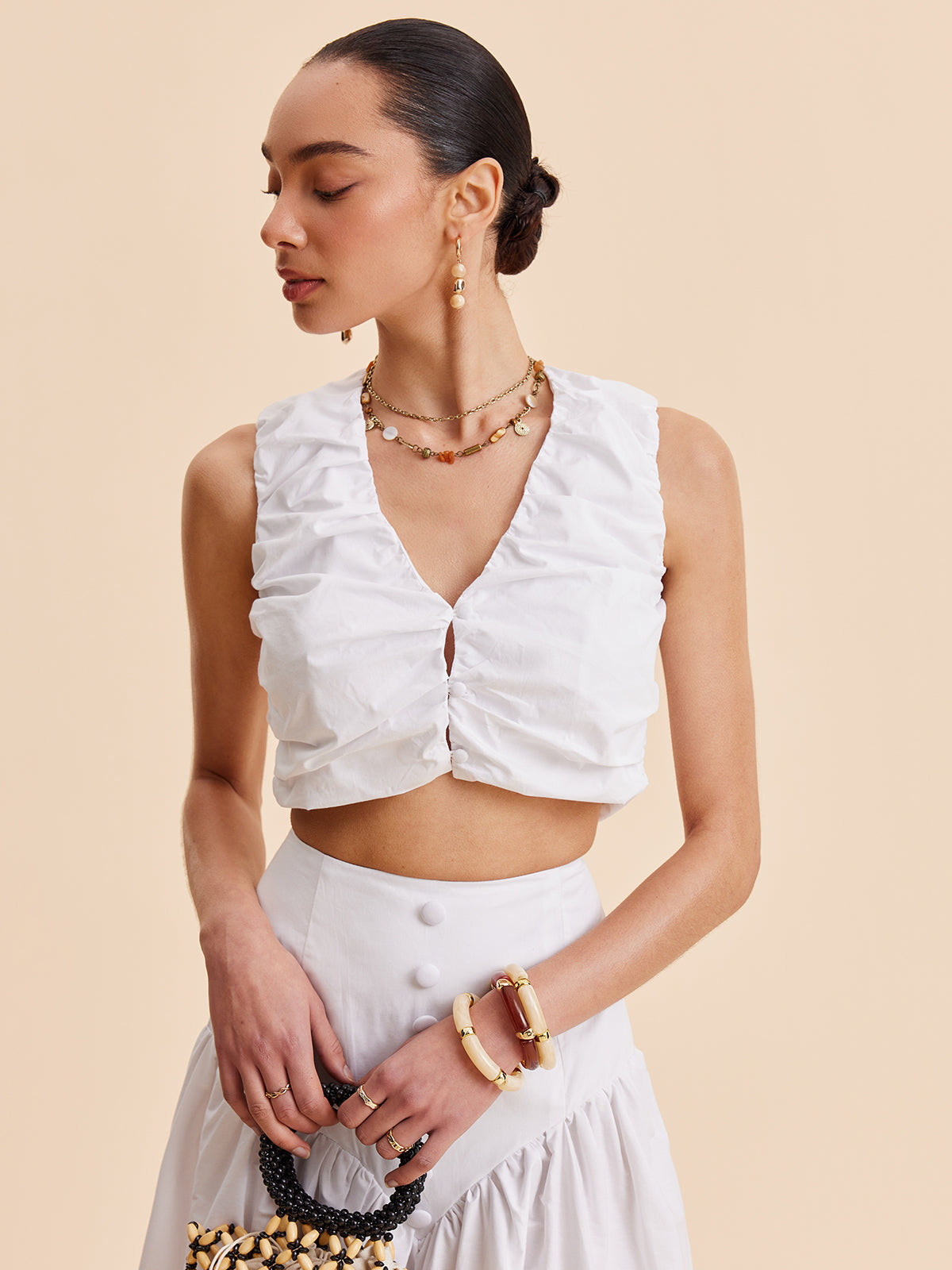 Ensemble crop top froncé et jupe boutonnée 