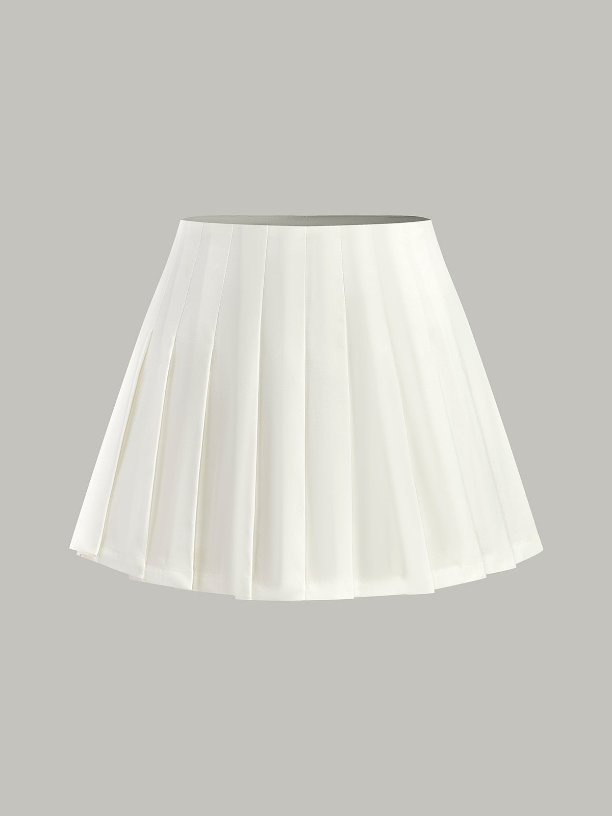 Jupe plissée taille mi-haute