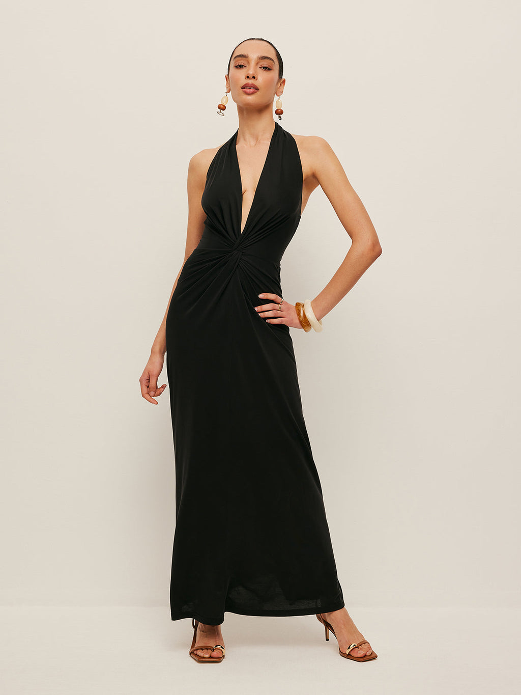 Robe dos-nu torsadée au décolleté en V