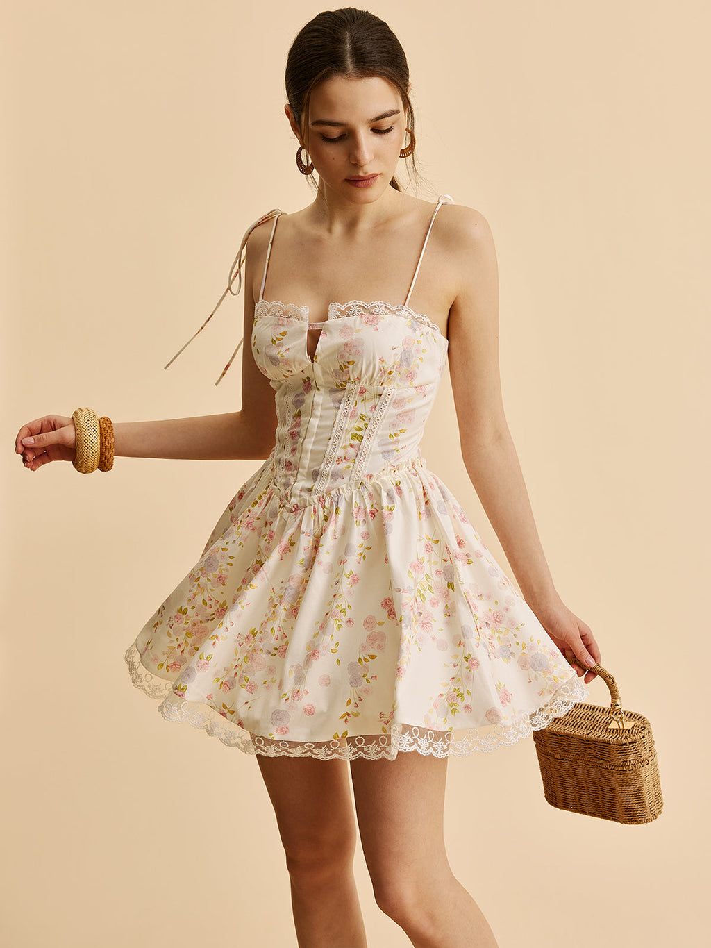 Korsettkleid mit Blumenmuster und Schleifenträgern