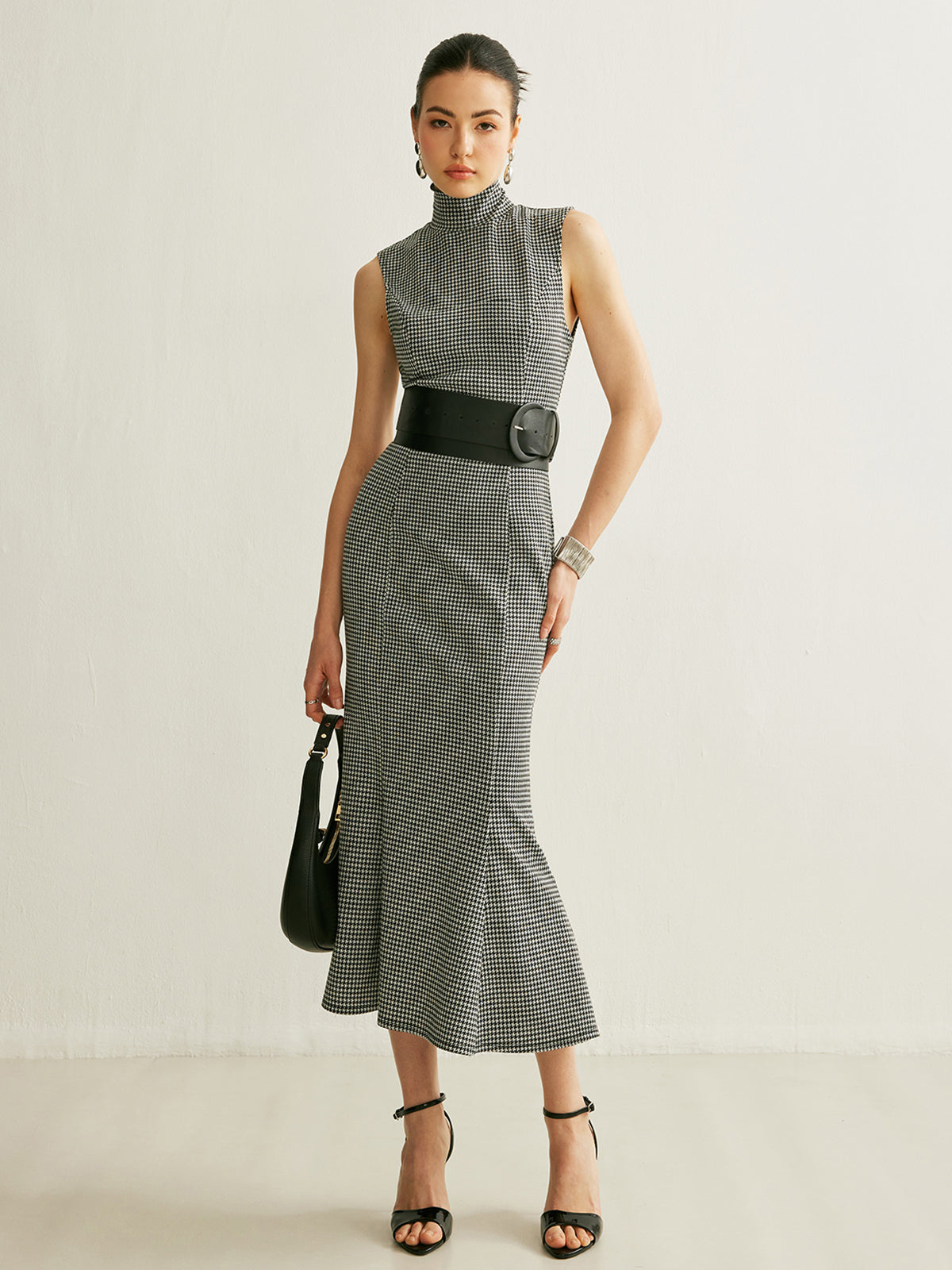 Robe sans manches à carreaux ceinturée 