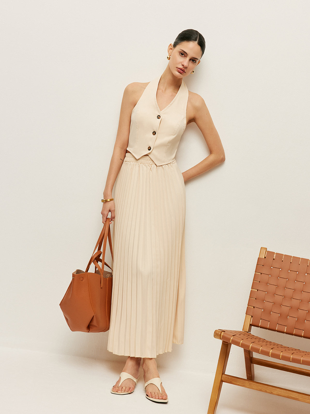 Ensemble gilet et jupe plissée 