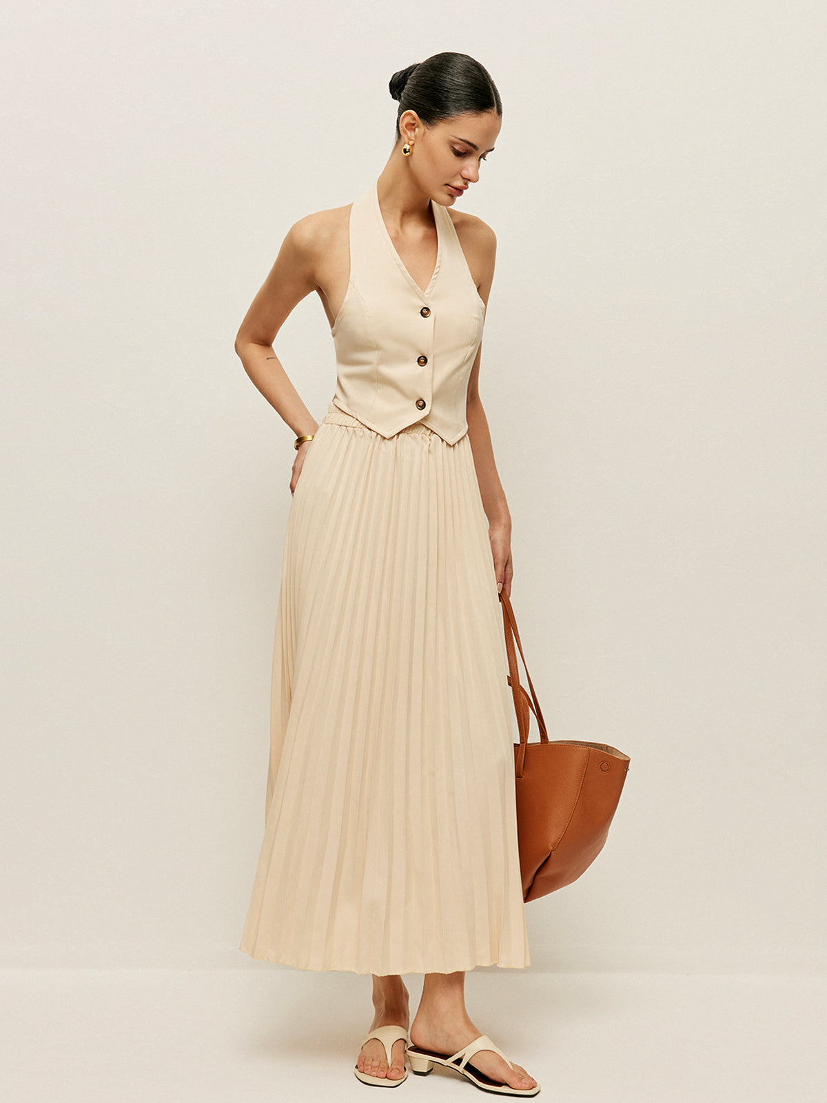 Ensemble gilet et jupe plissée 