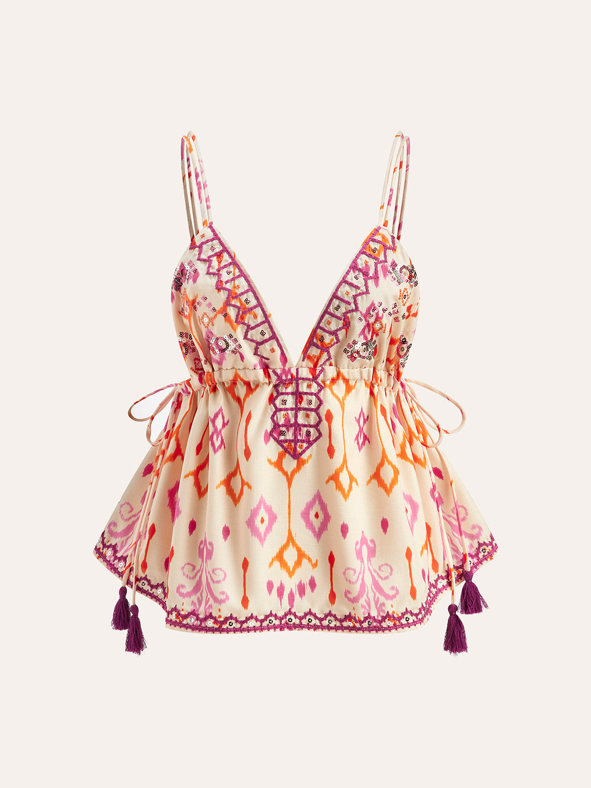 Haut caraco bohème à broderies et liens à pompons