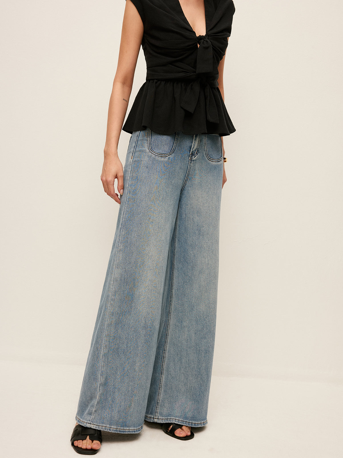 Jean en denim taille mi-haute, coupe large, avec poches