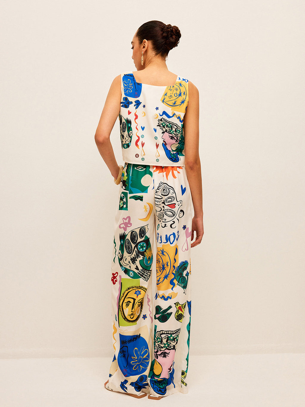 Bauchfreies Top mit Grafikdruck und Hose mit weitem Bein Set