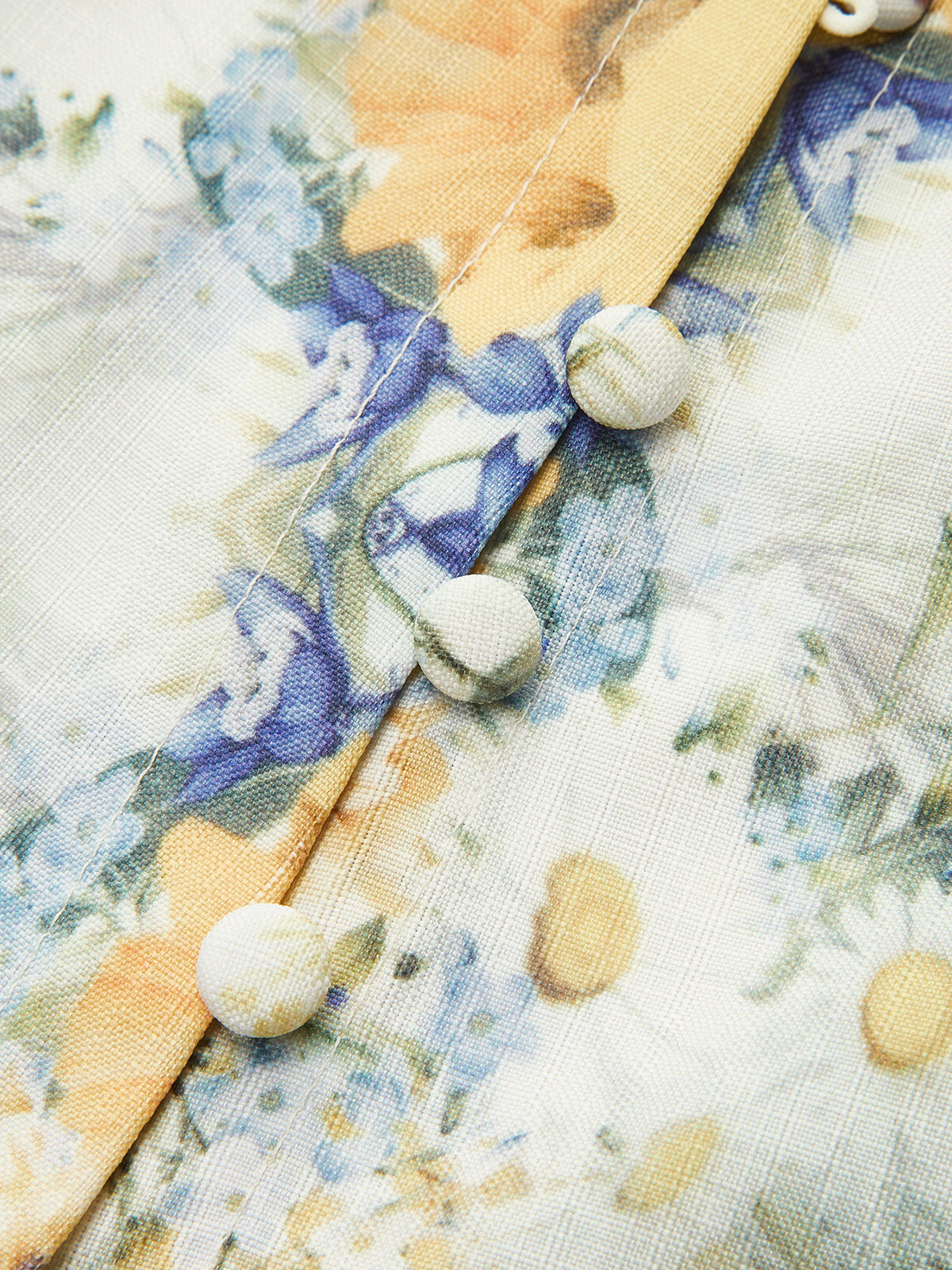 Robe fleurie à manches bouffantes et ceinture 