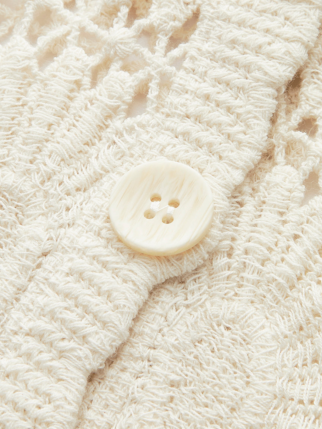 Gilet boutonné floral en crochet