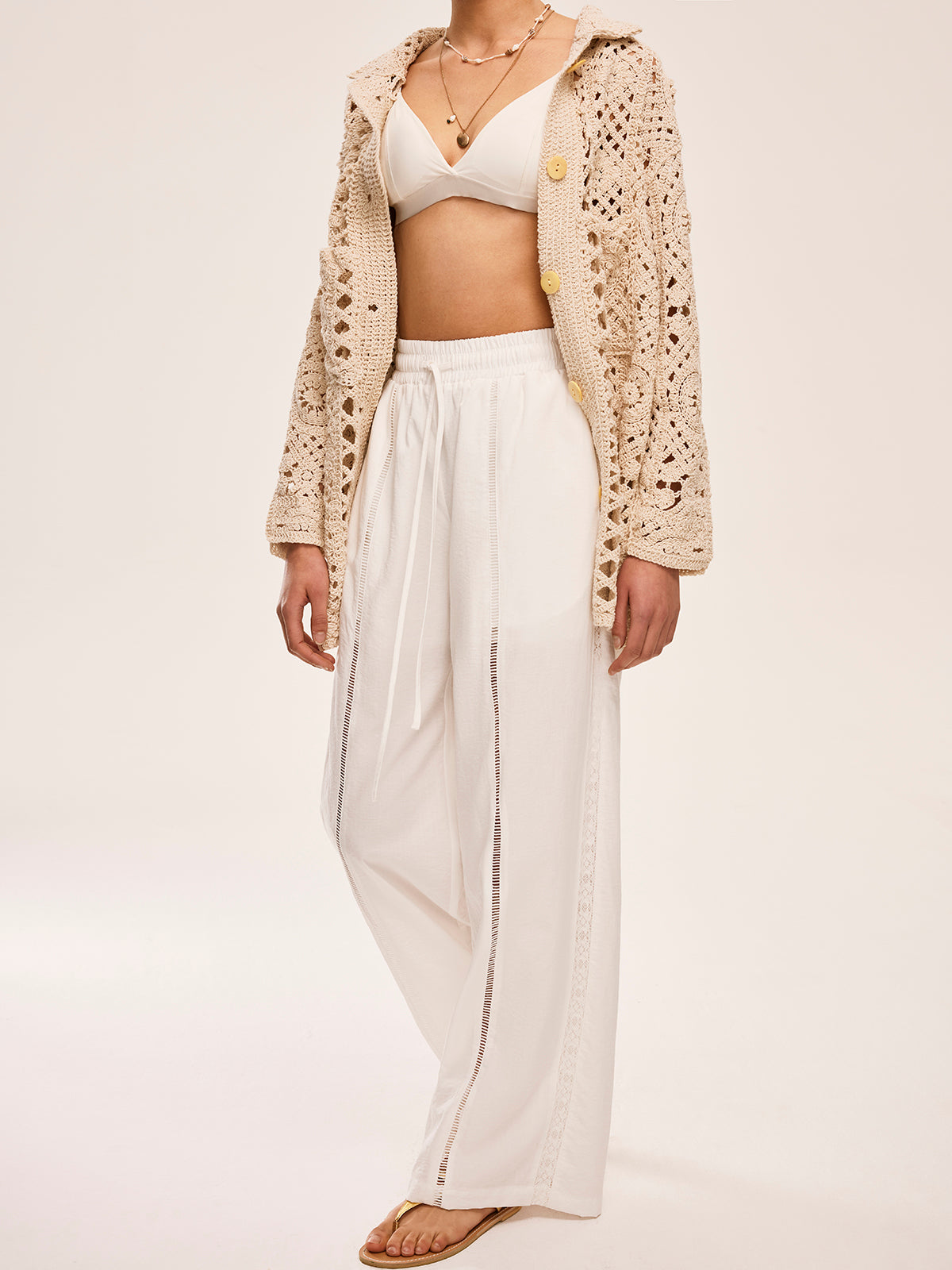 Pantalon semi-transparent taille haute avec poches 