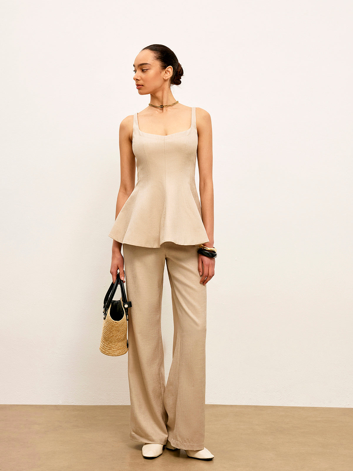 Haut péplum évasé à fermeture éclair au dos 