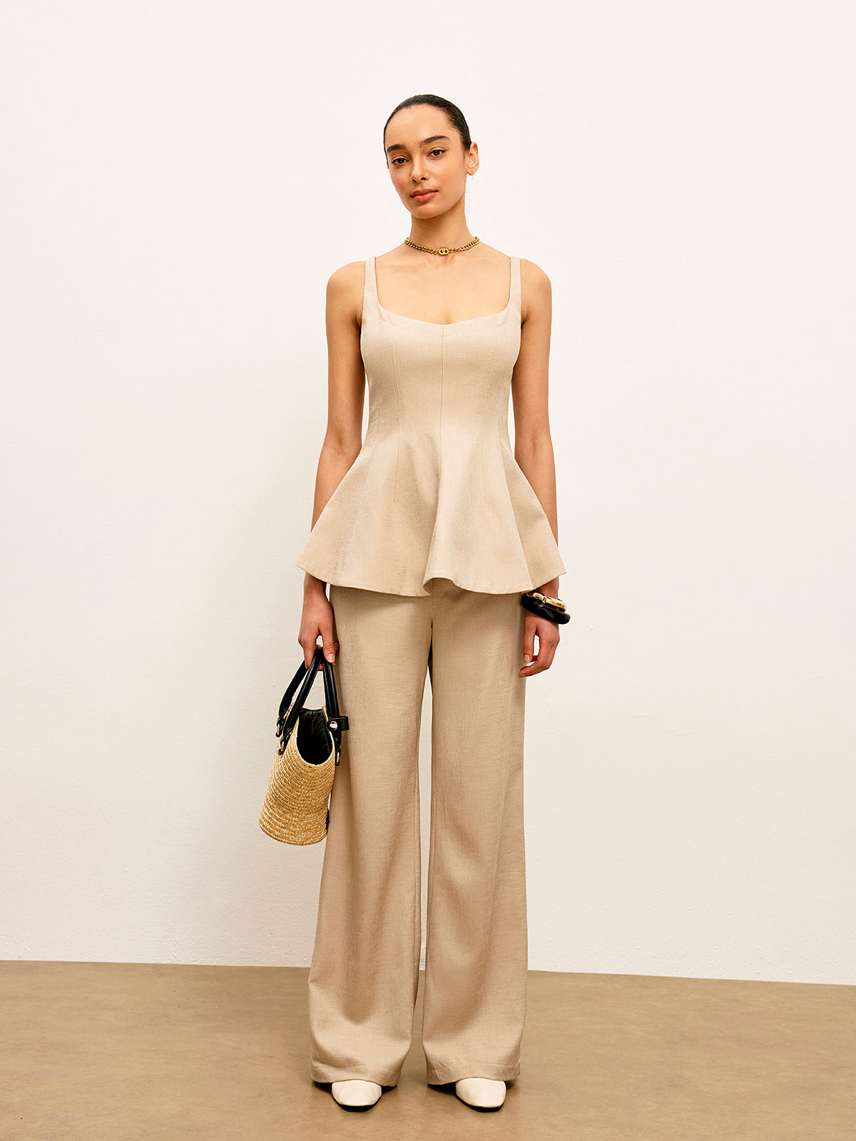 Haut péplum évasé à fermeture éclair au dos 