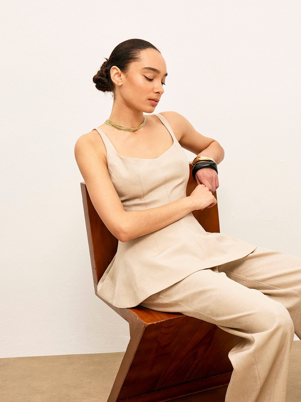 Haut péplum évasé à fermeture éclair au dos 