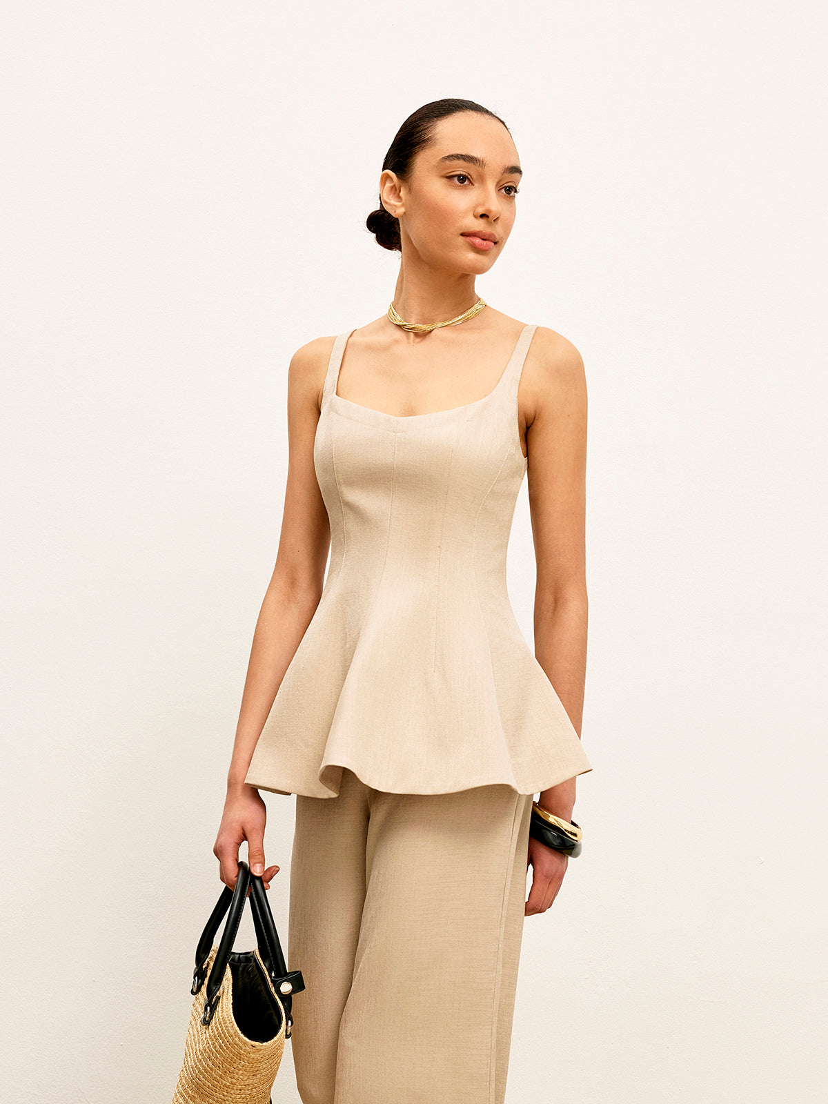 Haut péplum évasé à fermeture éclair au dos 