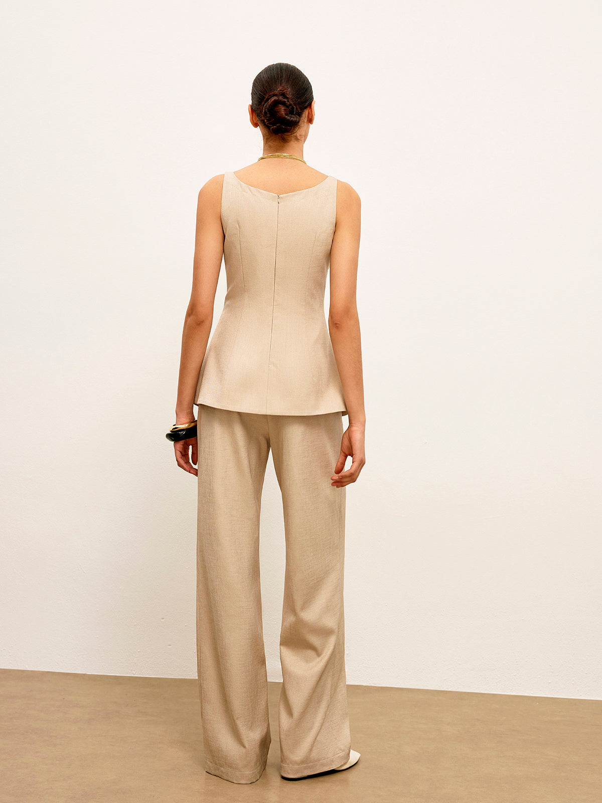 Haut péplum évasé à fermeture éclair au dos 