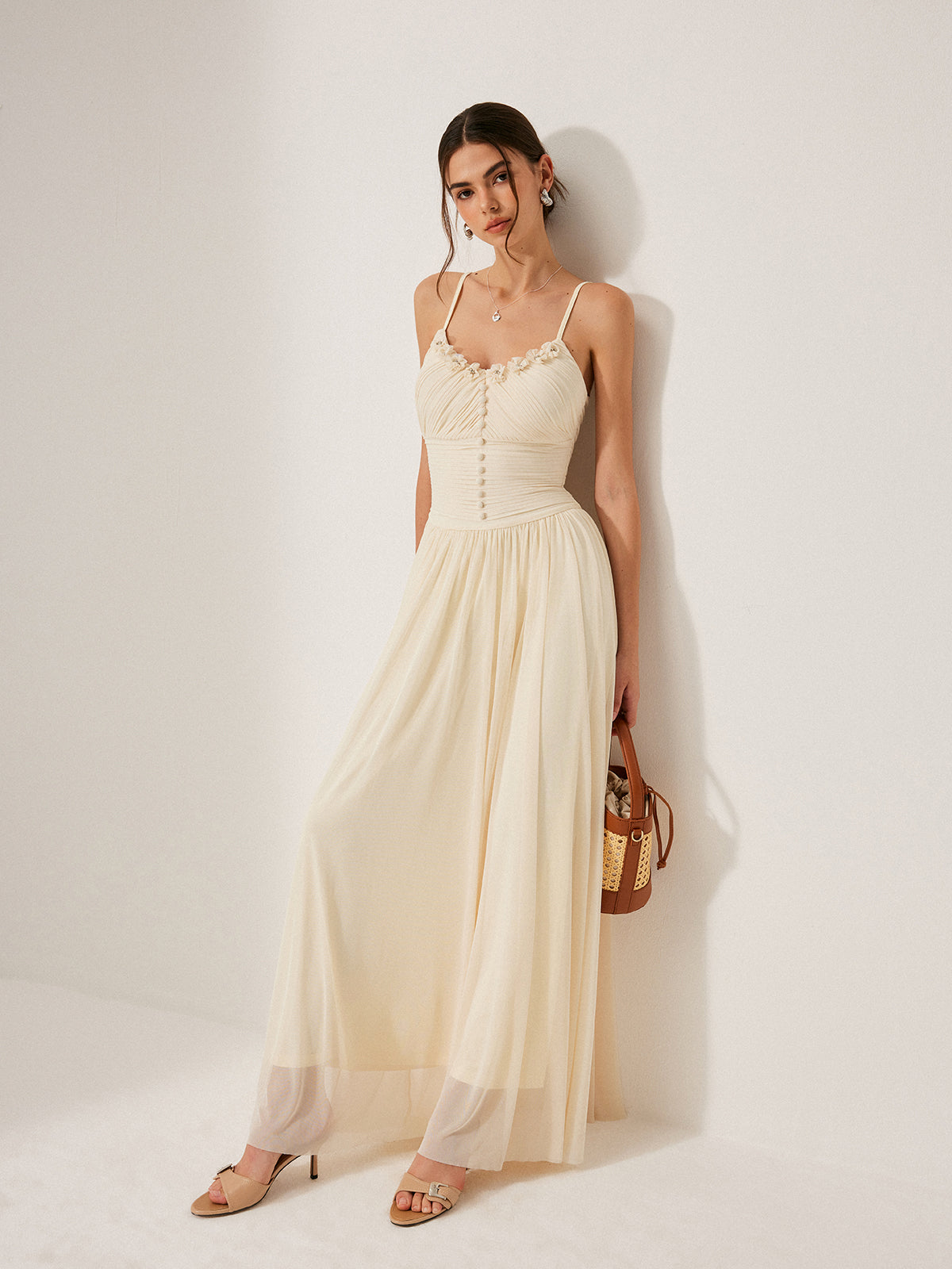 Kleid mit Knopfdetails und Mesh-Einsatz