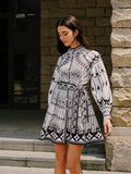 Robe longue ceinturée à manches longues en mélange de lin
