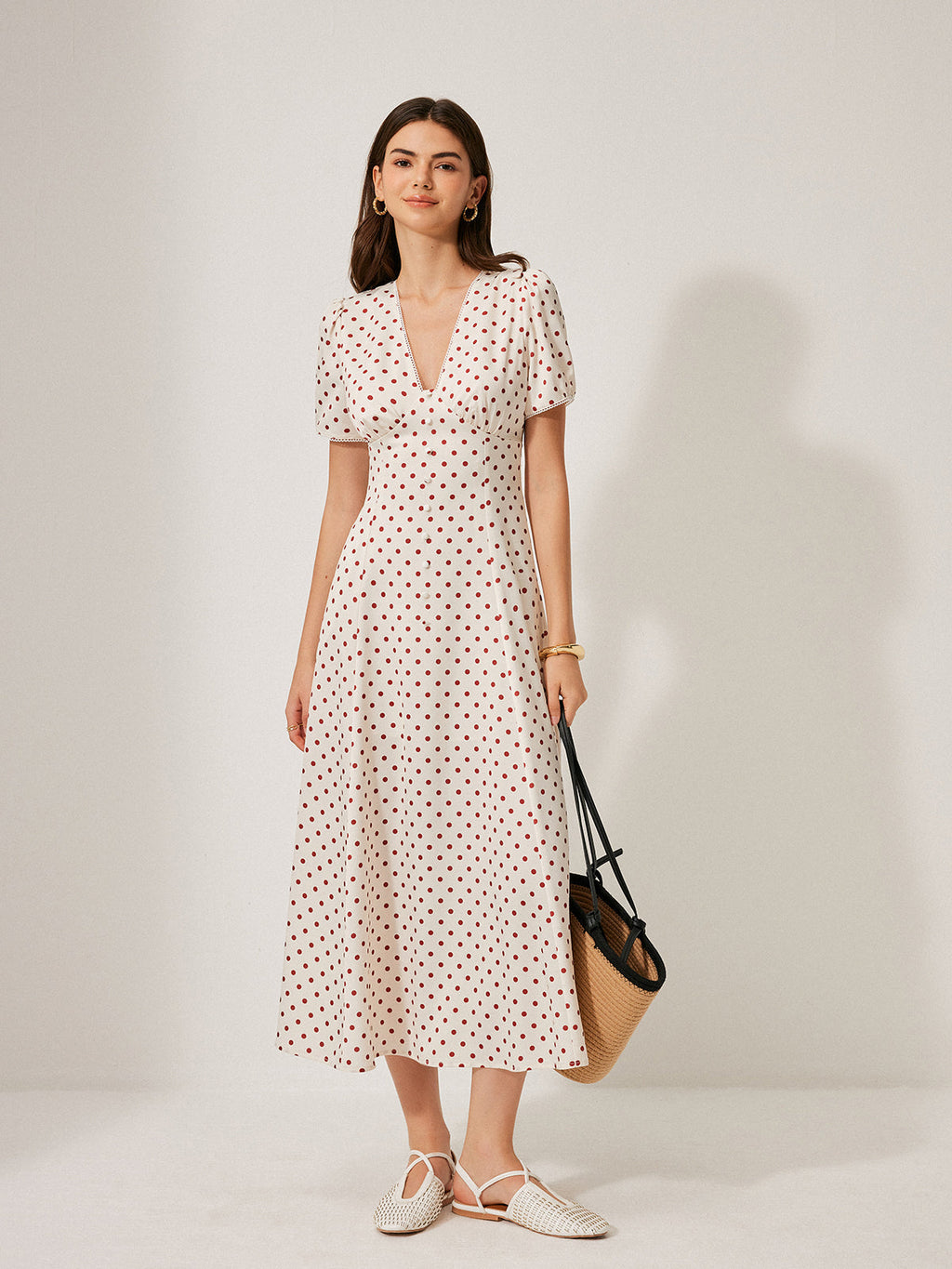 Robe à manches bouffantes à pois