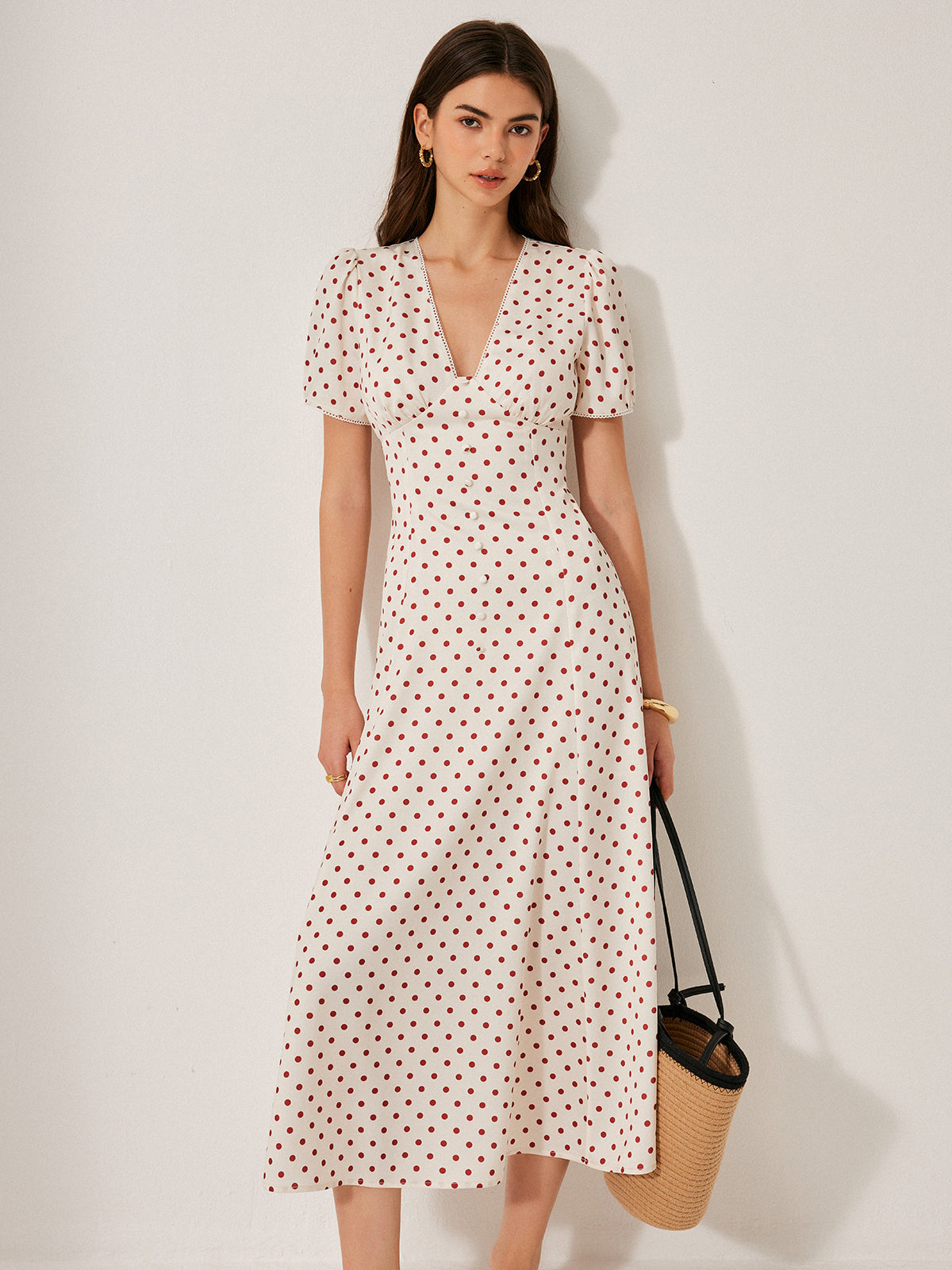 Robe à manches bouffantes à pois