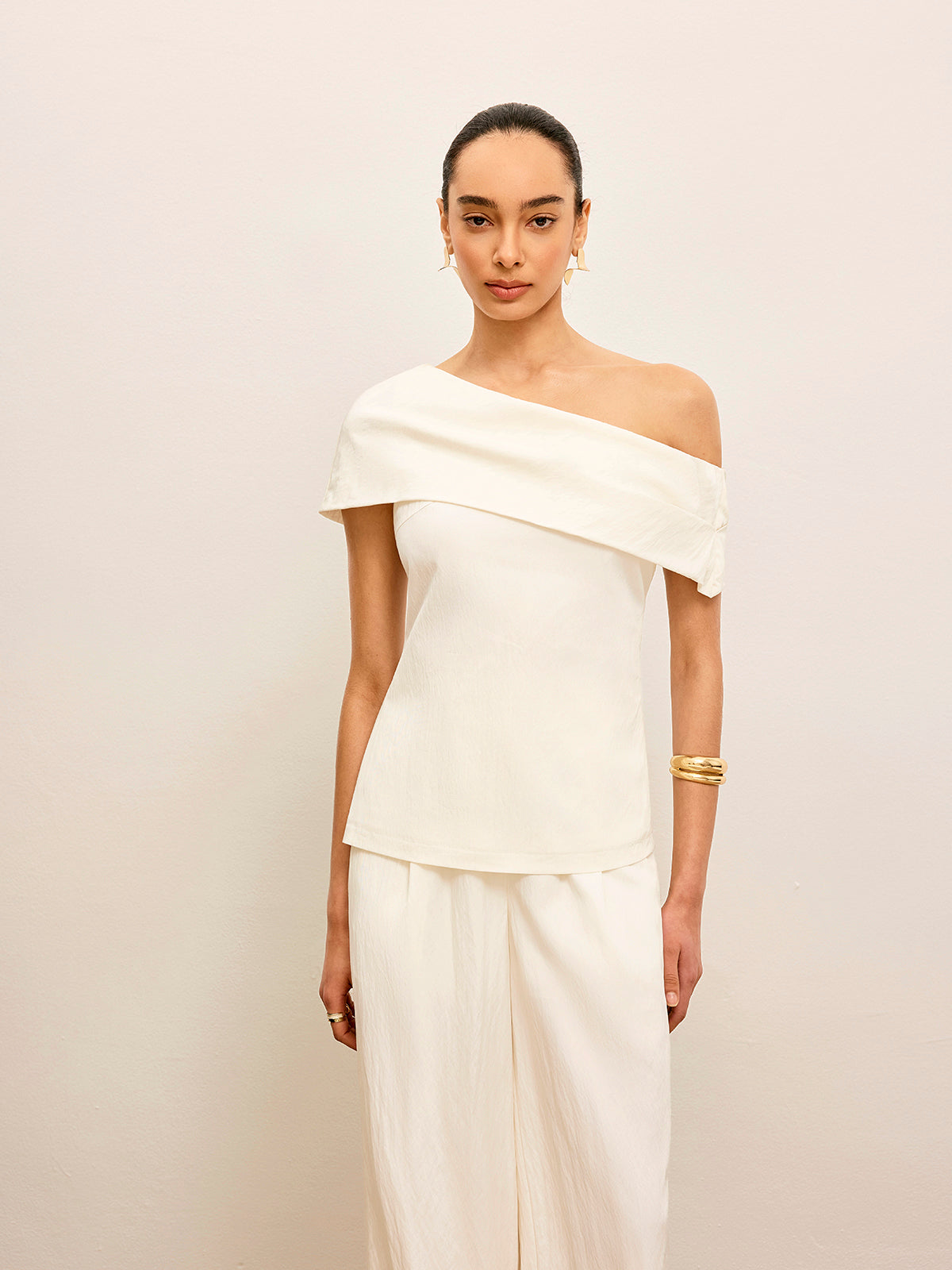 Haut drapé à une épaule 