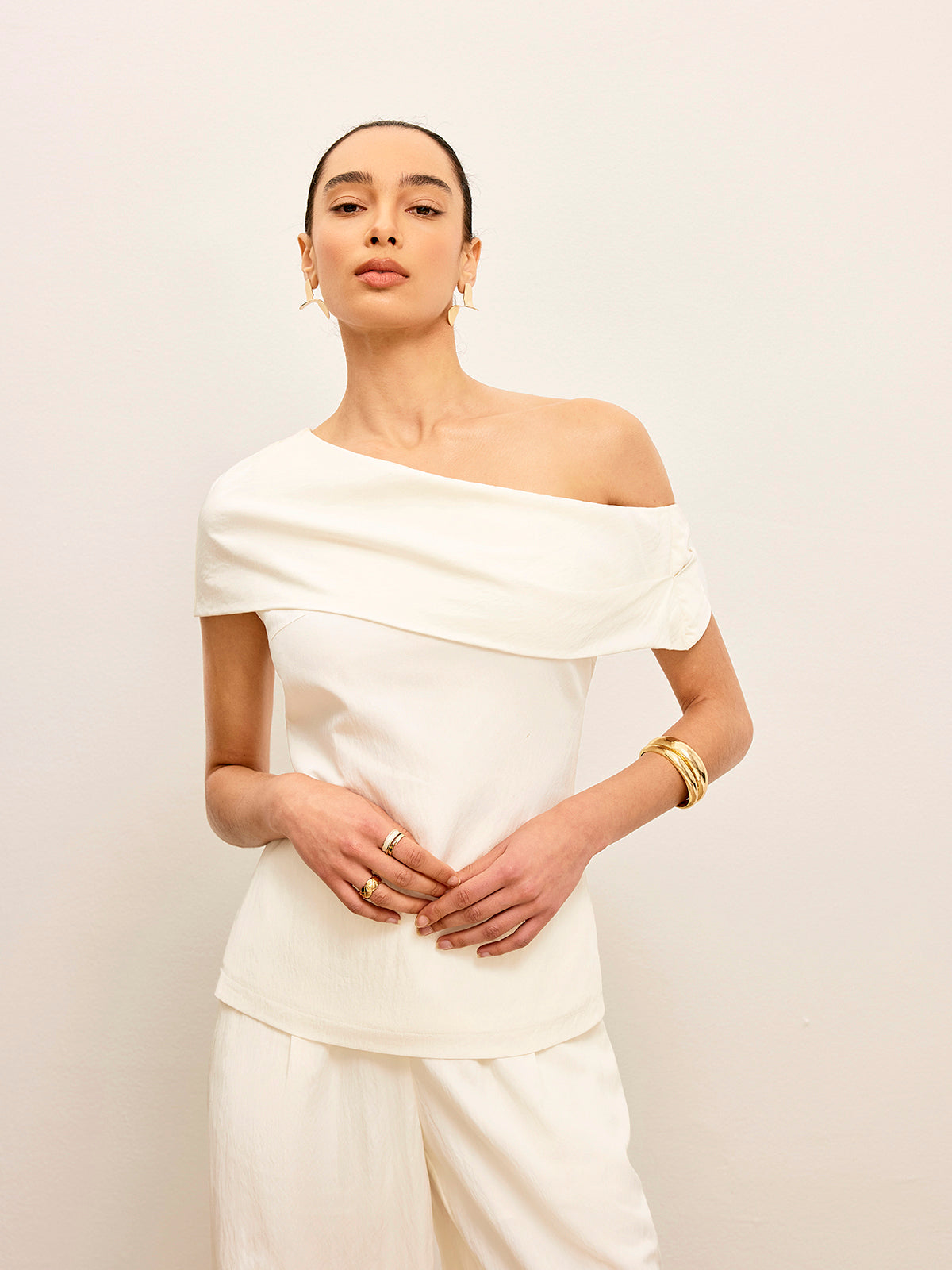 Haut drapé à une épaule 