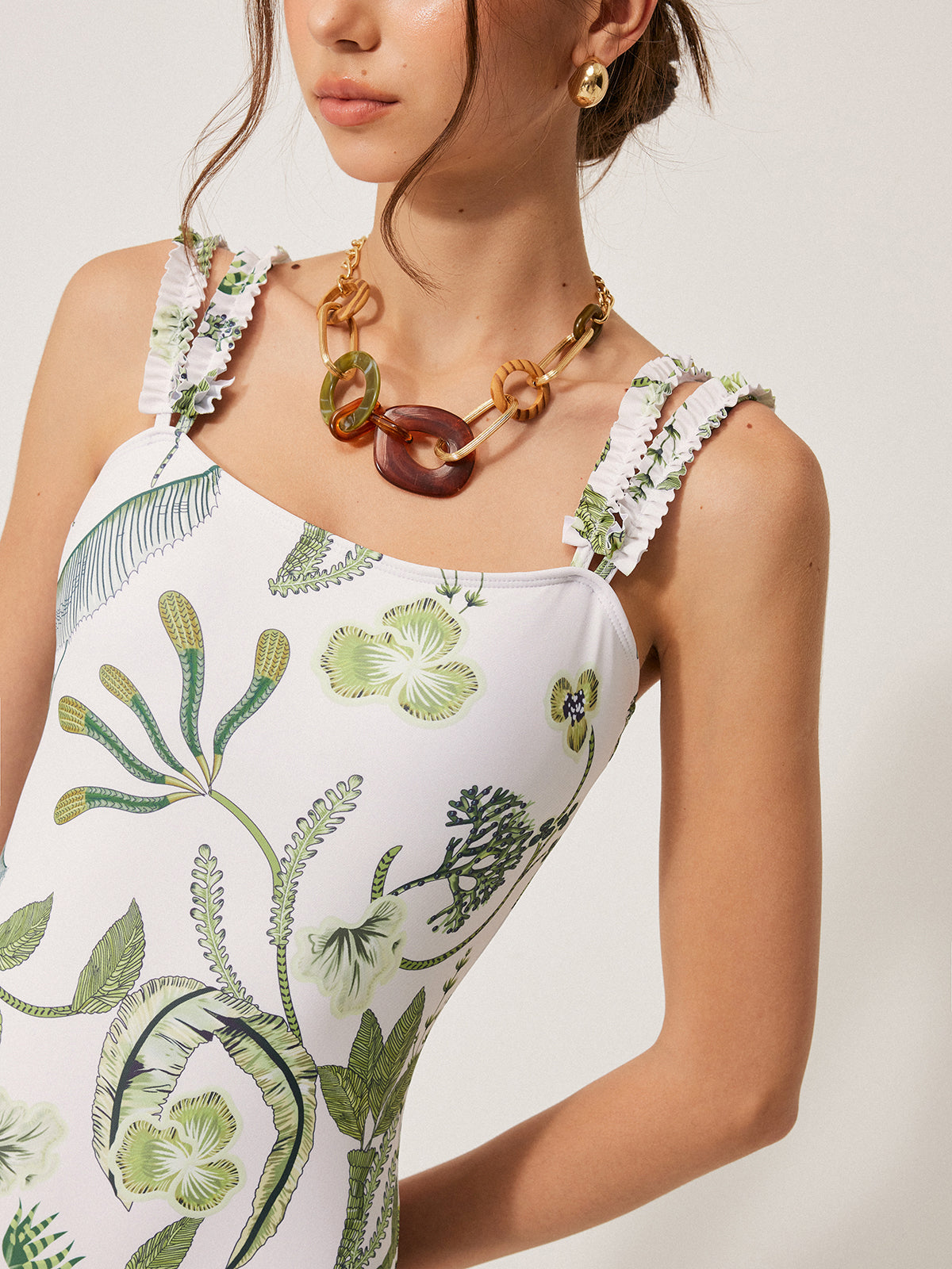 Badeanzug mit Blumenmuster und Rüschenträgern 