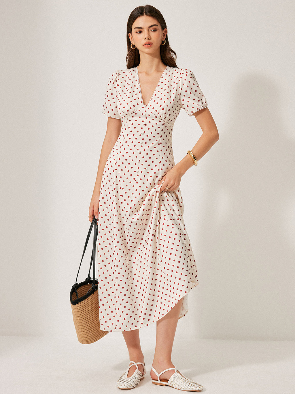 Robe à manches bouffantes à pois