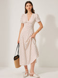 Robe à manches bouffantes à pois