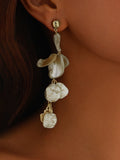 Boucles d'oreilles pendantes coquillages et perles