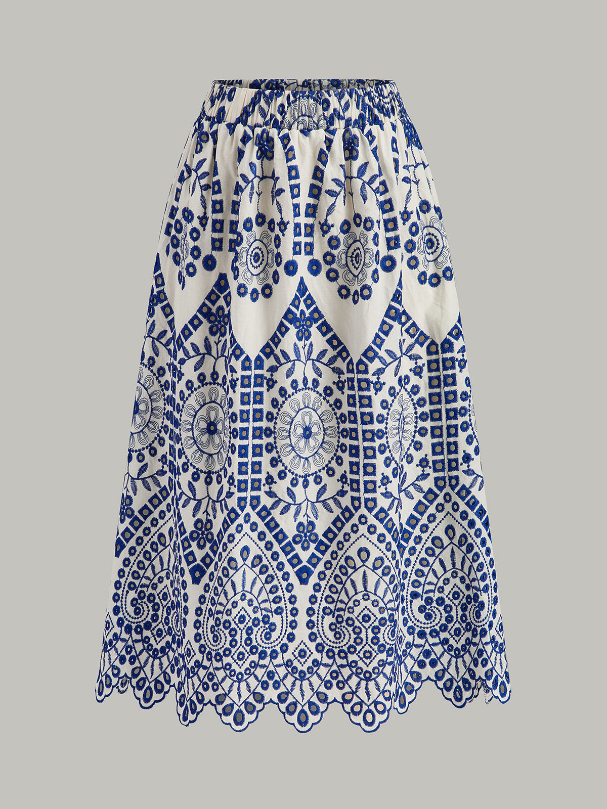 Rock aus Baumwolle mit Stickerei, gewelltem Saum und elastischem Bund 