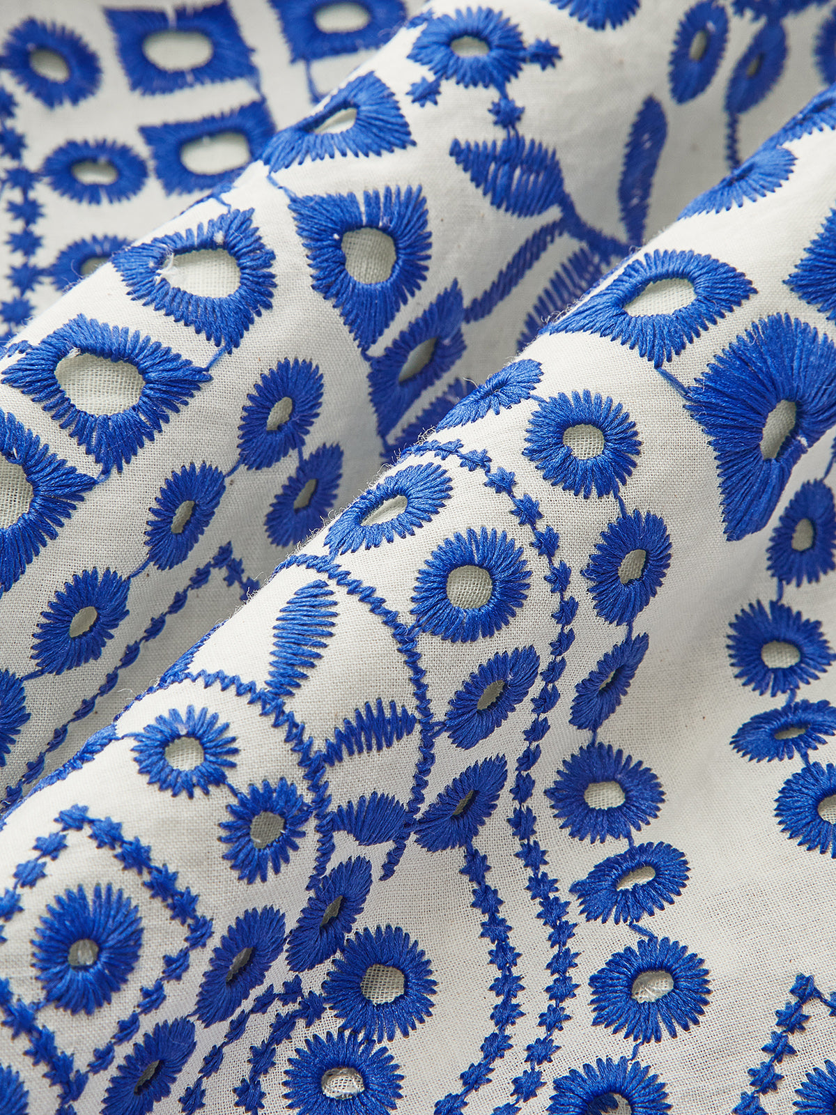 Rock aus Baumwolle mit Stickerei, gewelltem Saum und elastischem Bund 