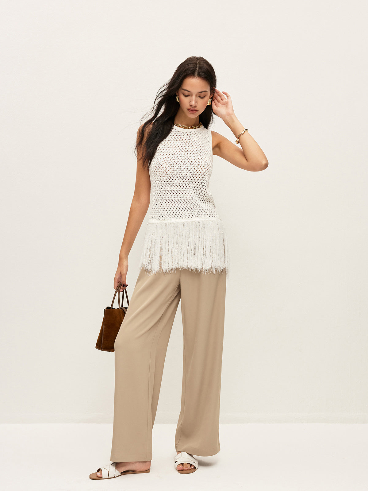 Gilet en maille semi-transparent à ourlet frangé