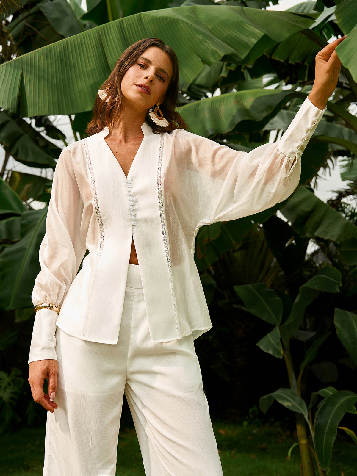 Chemisier transparent à manches bouffantes 