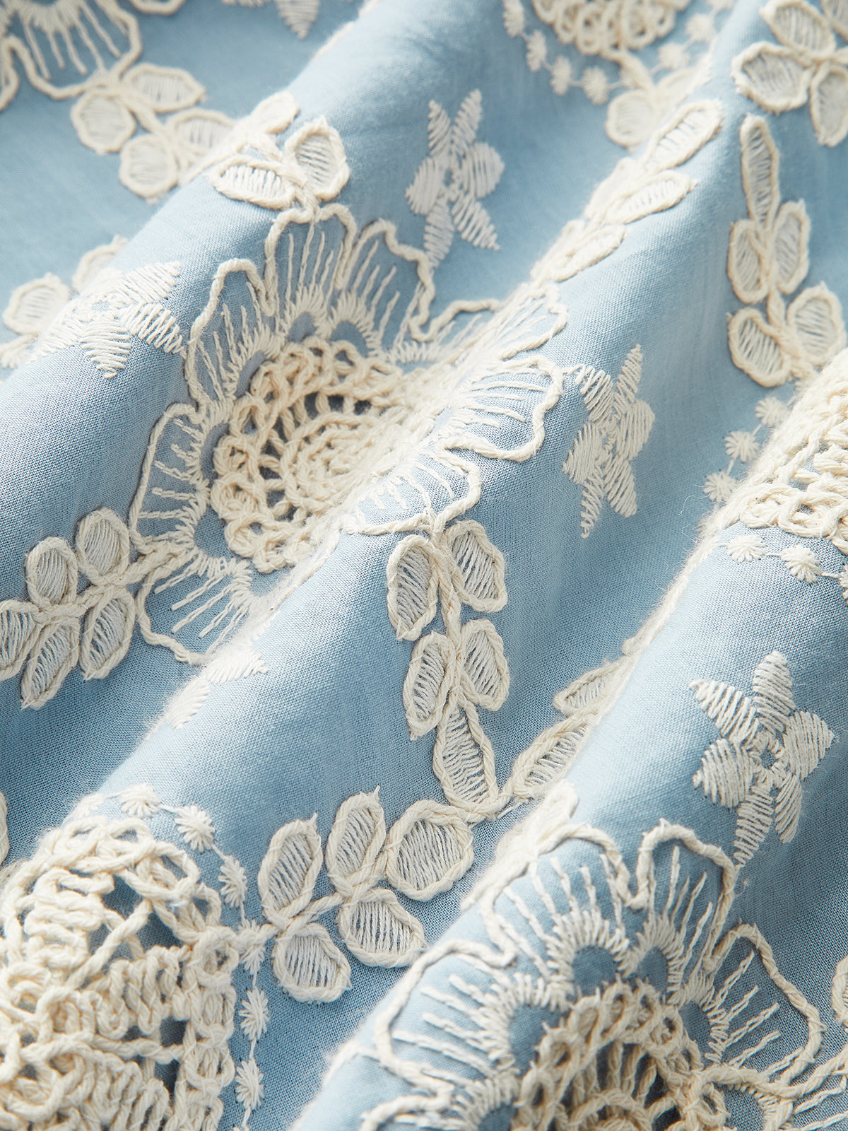 Robe sans manches en coton brodé 