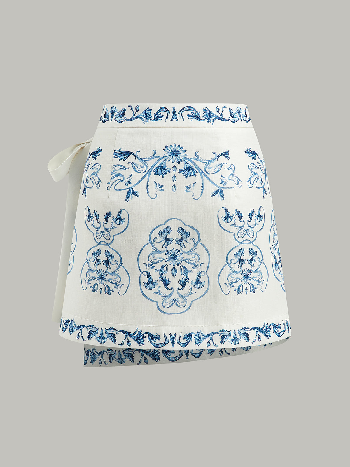 Wickelrock mit Blumenmuster und Bindegürtel 