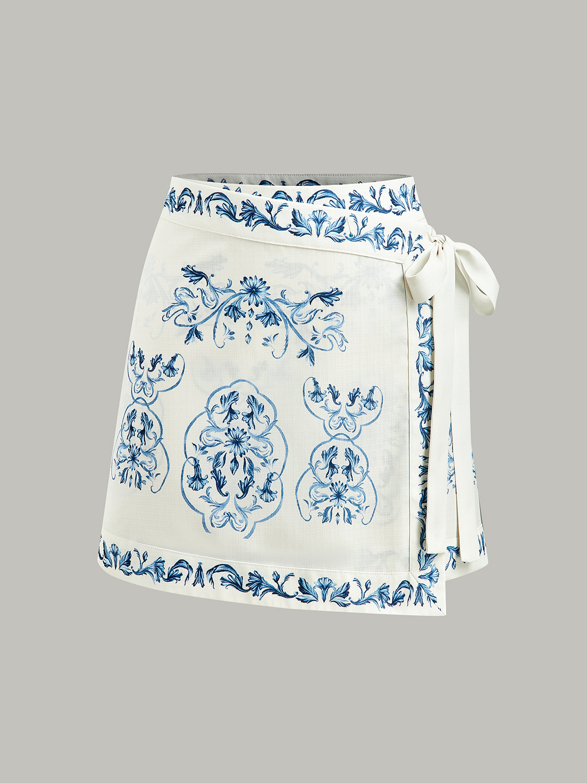 Wickelrock mit Blumenmuster und Bindegürtel 