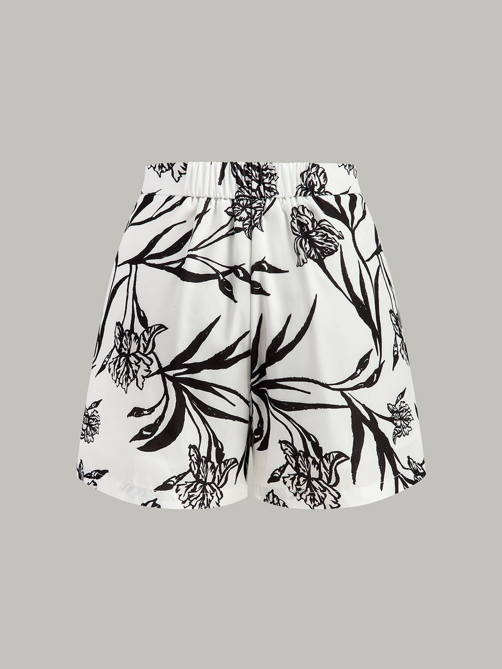 Ensemble haut péplum imprimé floral et short