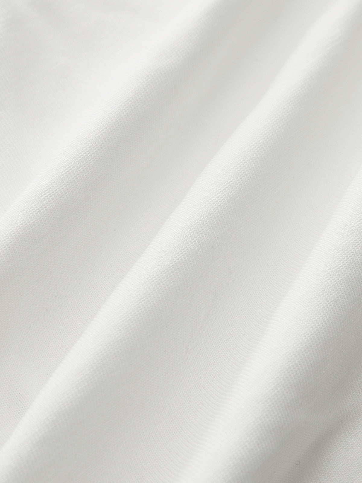 T-shirt à col en V et nœud sur le devant 