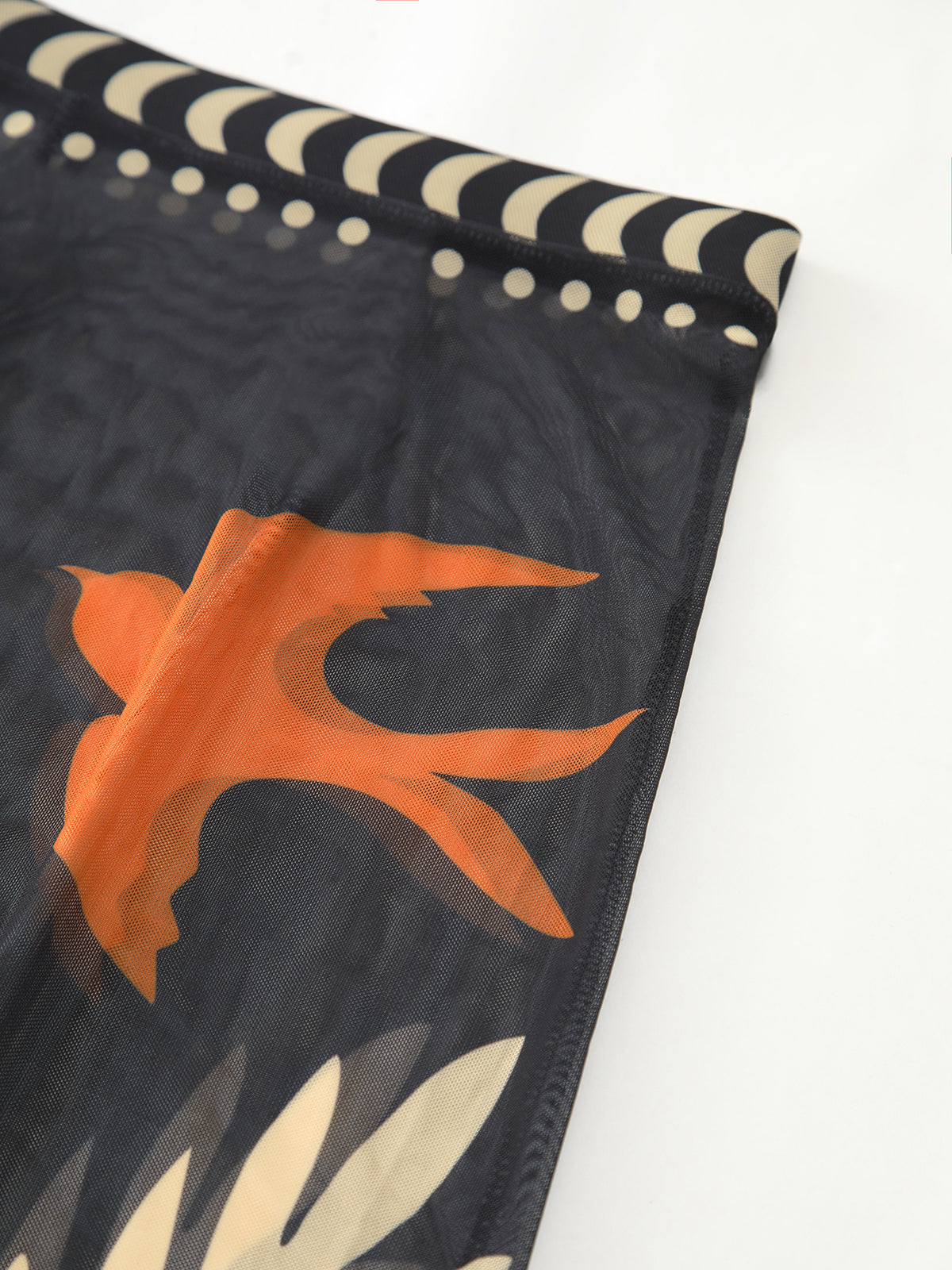 Jupe longue cache-cou en résille à imprimé oiseaux